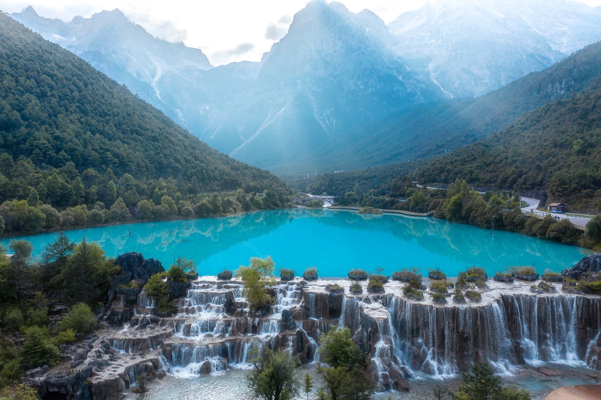 The Lijiang snow-mountain spectacle | Golden sunrise → Jade Dragon Snow Mountain → Impression Lijiang → Blue Moon Valley → Shuhe Old Town | Overnight in Lijiang