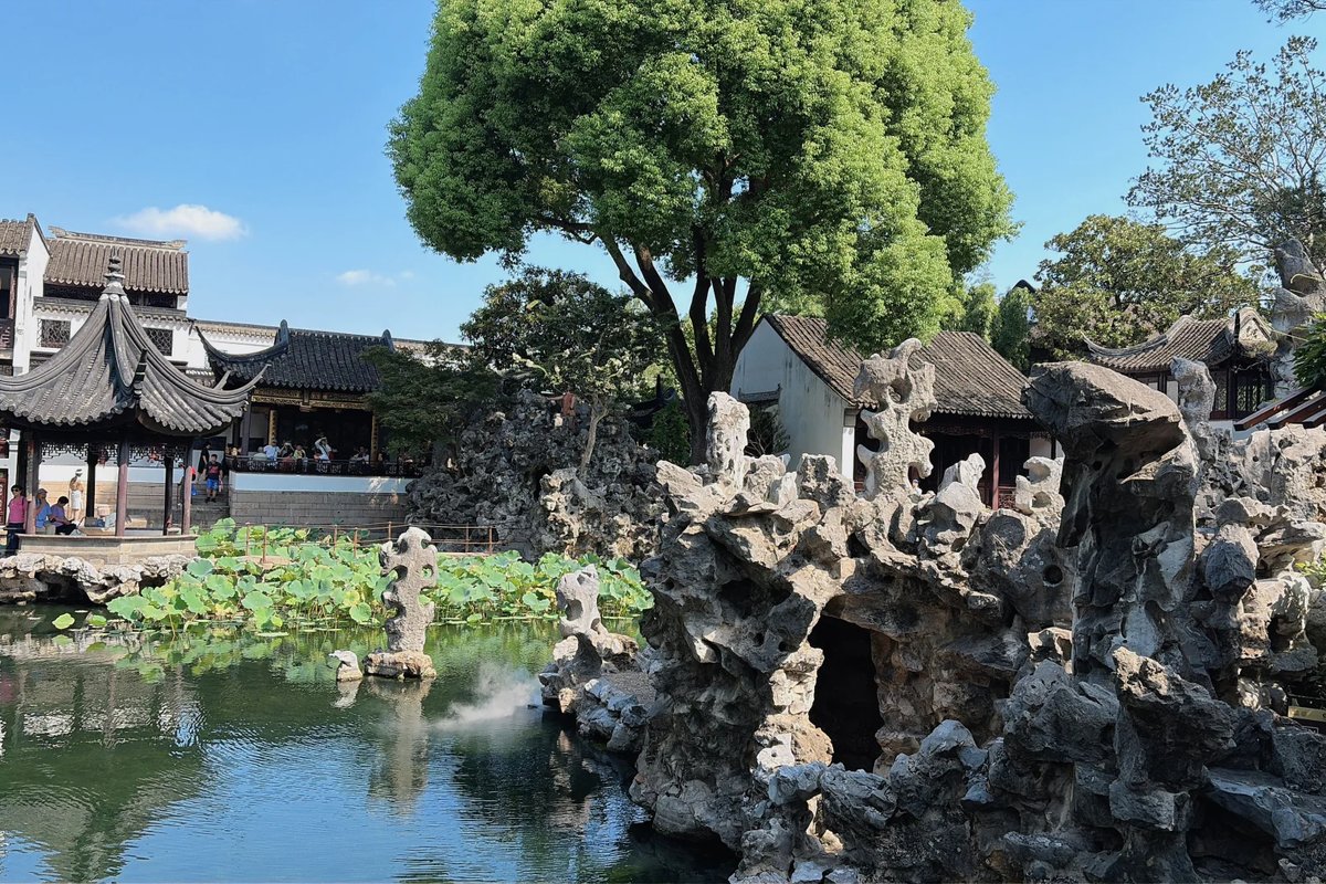 Lion Grove Garden → Hanshan Temple → Qili Shantang Street (overnight: Suzhou)