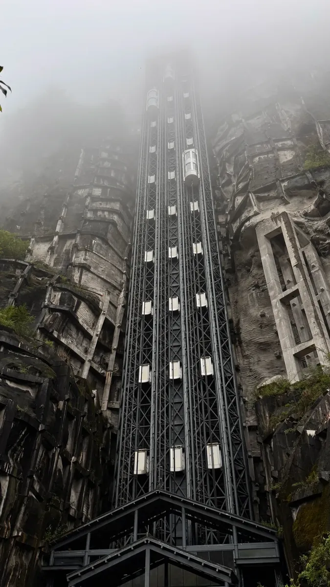 An 80-metre glass lift drops straight to the valley floor