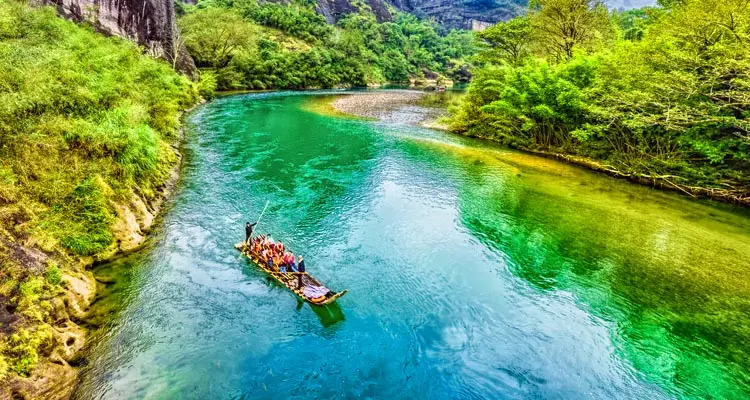 Drift down the Nine-Bend Stream on a bamboo raft