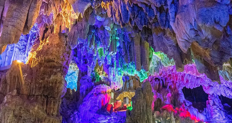 Follow your guide into Guilin's most beautiful caves