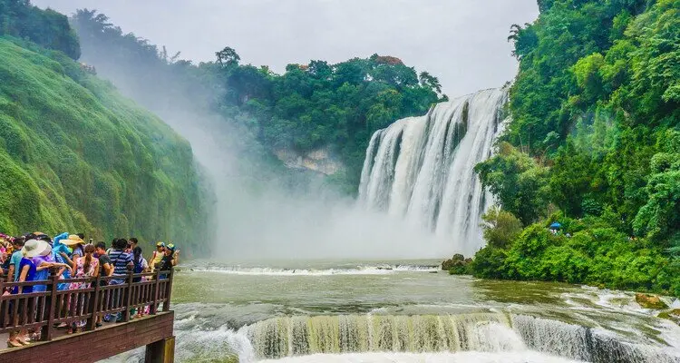 Visit one of Asia's largest waterfalls and step into Sun Wukong's Water Curtain Cave