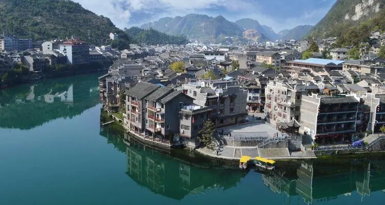 Find serenity in Zhenyuan Ancient Town, embraced by the Wuyang River
