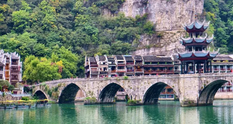 Find serenity in Zhenyuan Ancient Town, embraced by the Wuyang River