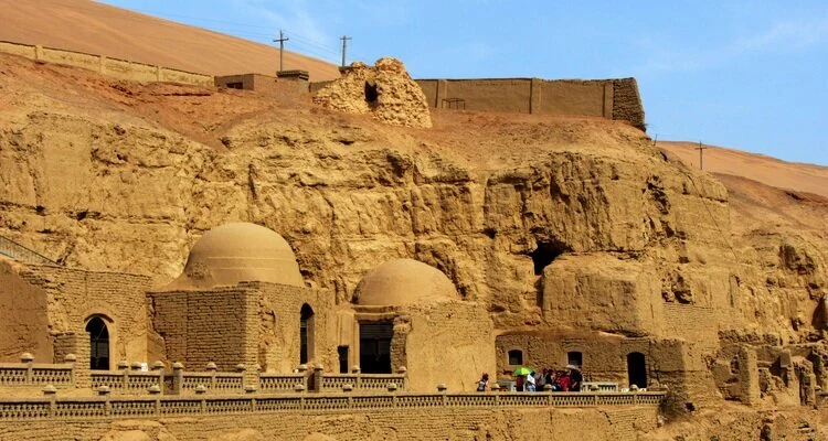 Step into the Bezeklik Thousand Buddha Caves and admire their fine Buddhist murals